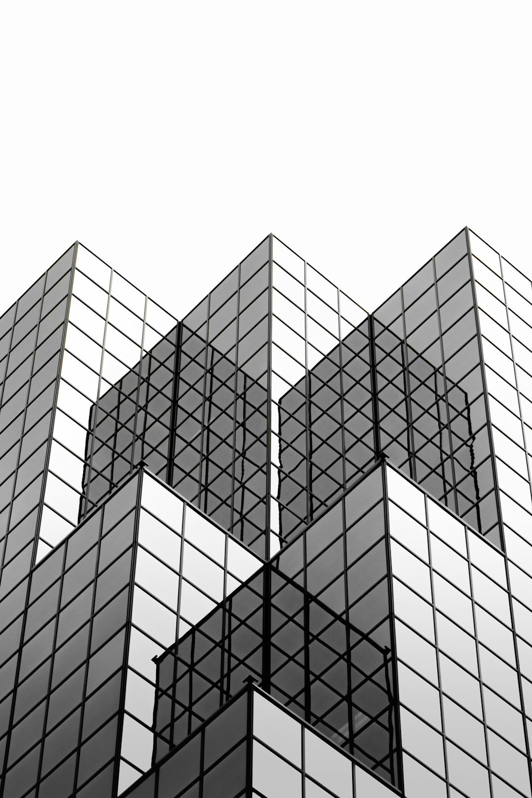 a black and white photo of a tall building divi theme blog module wordpress grid - AI Bud