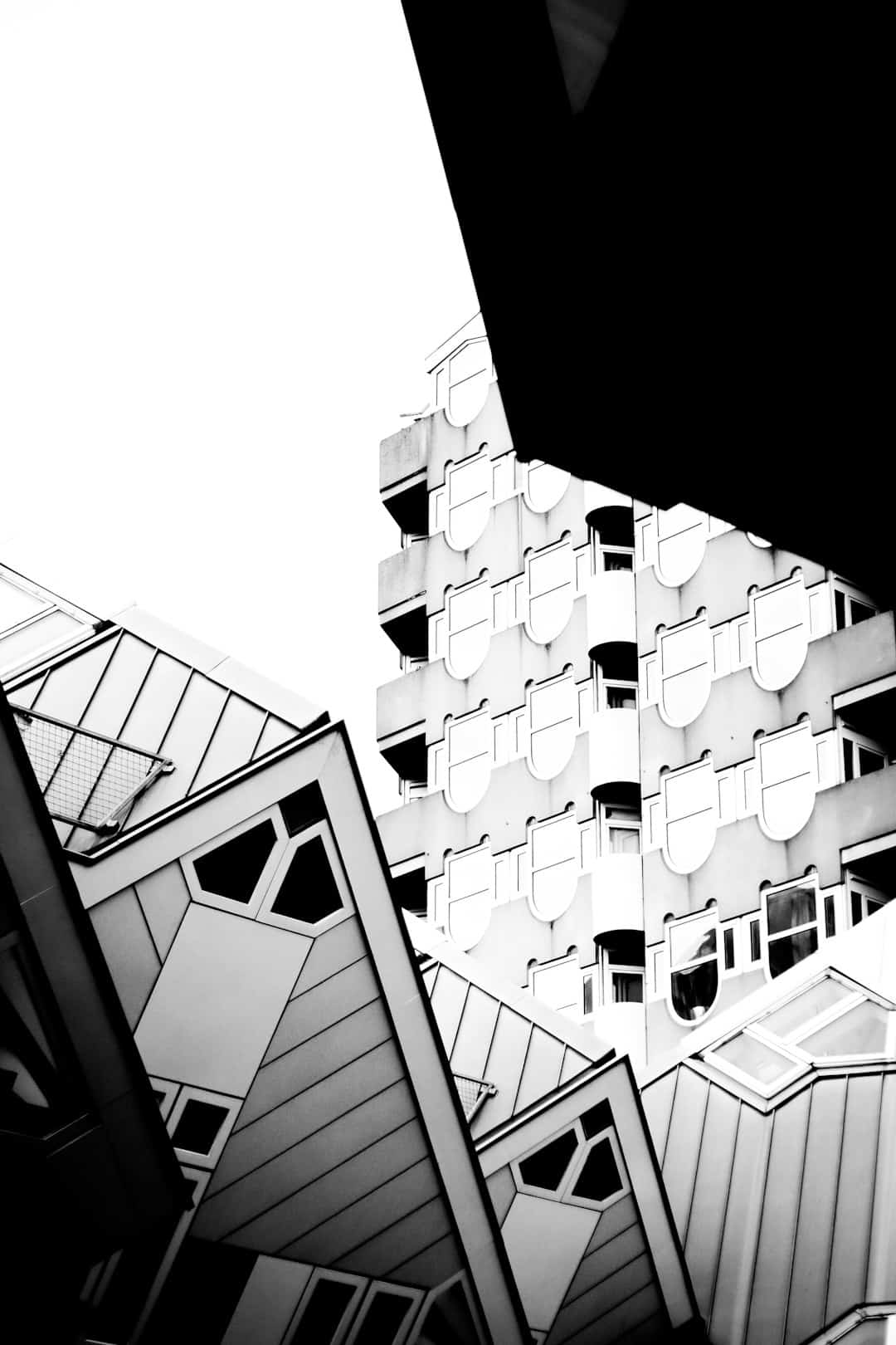 A black and white photo of some buildings level design geometry clutter visual noise - AI Bud