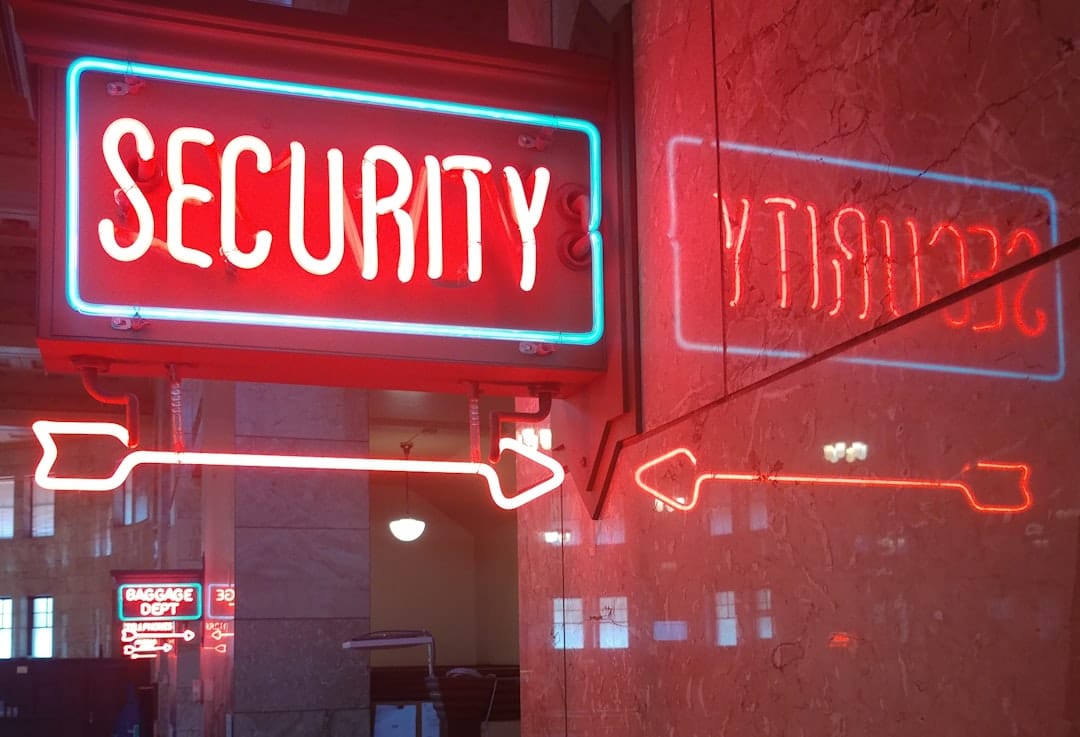 a red security sign and a blue security sign personal data chat security privacy settings - AI Bud