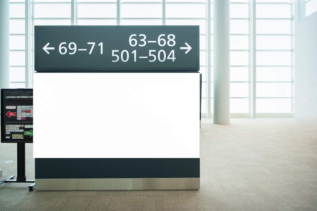 a sign in an airport showing the time of departure wordpress seo plugin dashboard interface - AI Bud