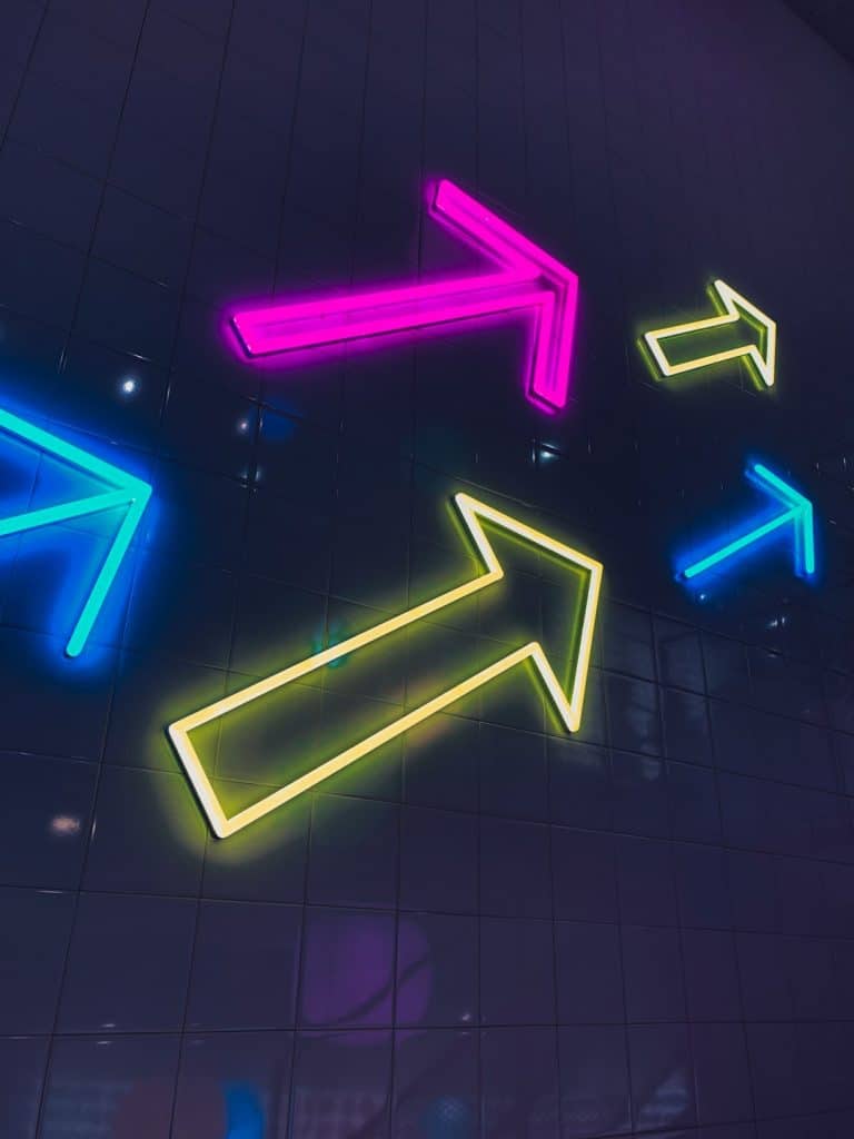 arrow neon signages geometry runner colorful graphics gameplay screenshot - AI Bud