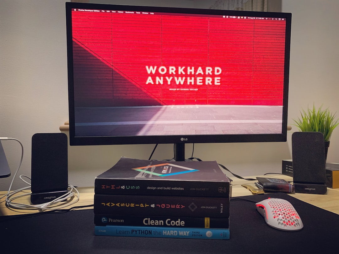 black flat screen tv turned on near white remote control ftp wordpress wpconfig code editor - AI Bud