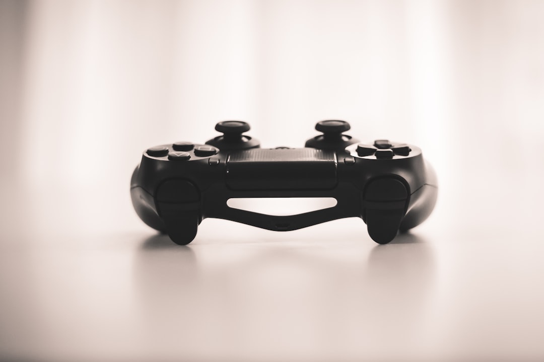 black wireless game controller game feedback player review mobile gaming - AI Bud