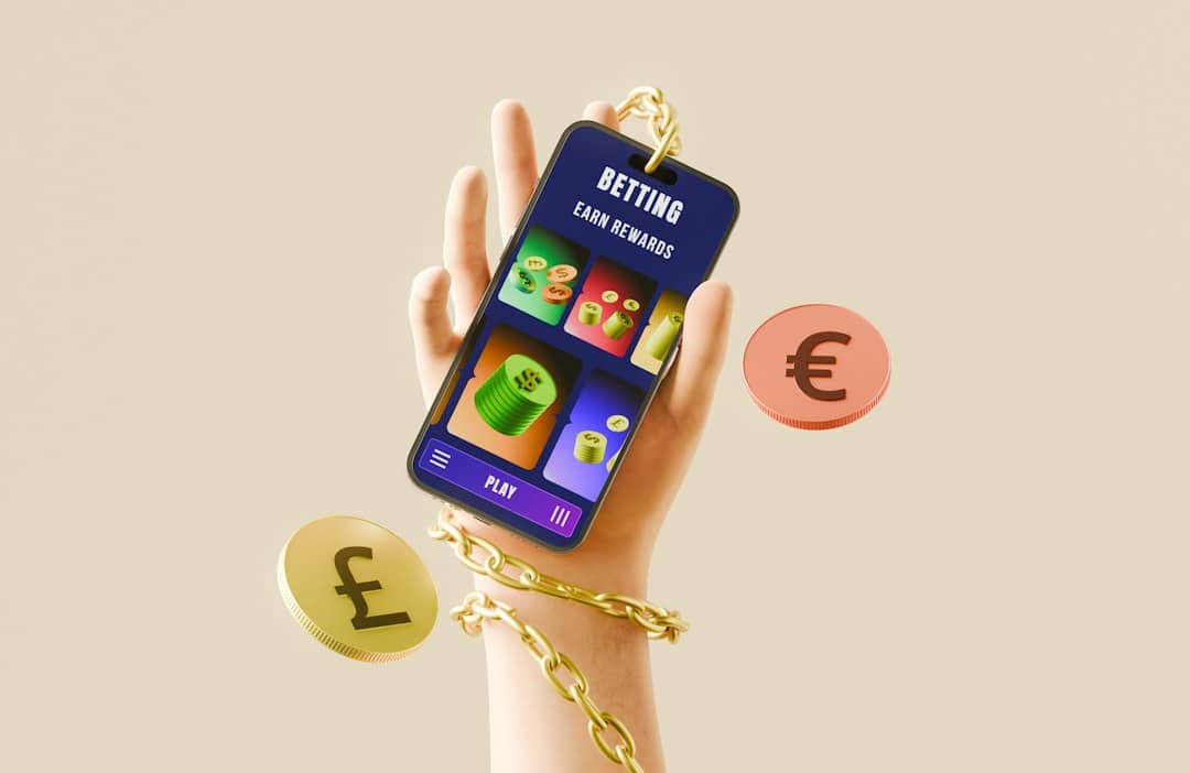 Hand holding a smartphone showing a betting app screen with rewards, chained wrist, and floating euro coins around.