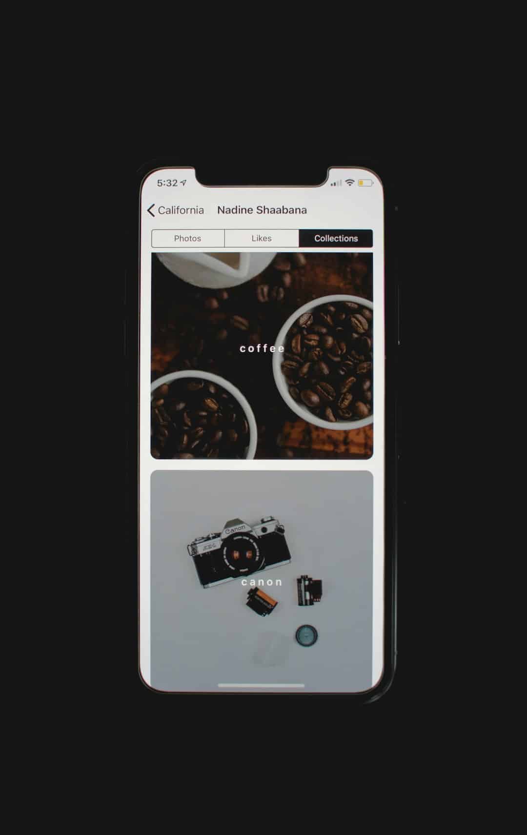 Profile screen on a mobile app showing user Nadine Shaabana with tabs Photos, Likes, Collections and a grid of images (coffee cups) labeled 'coffee' and a Canon camera photo labeled 'canon'.