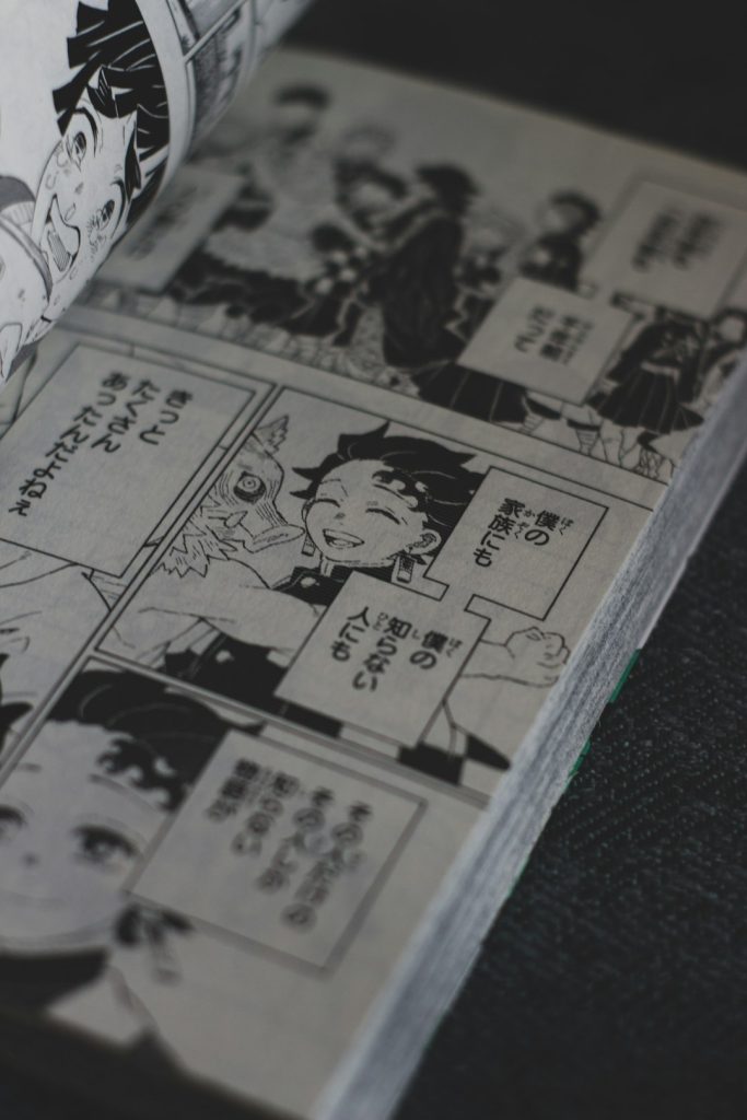 a close up of a book with a cartoon on it anime blog screenshot otaku website blog post layout - AI Bud