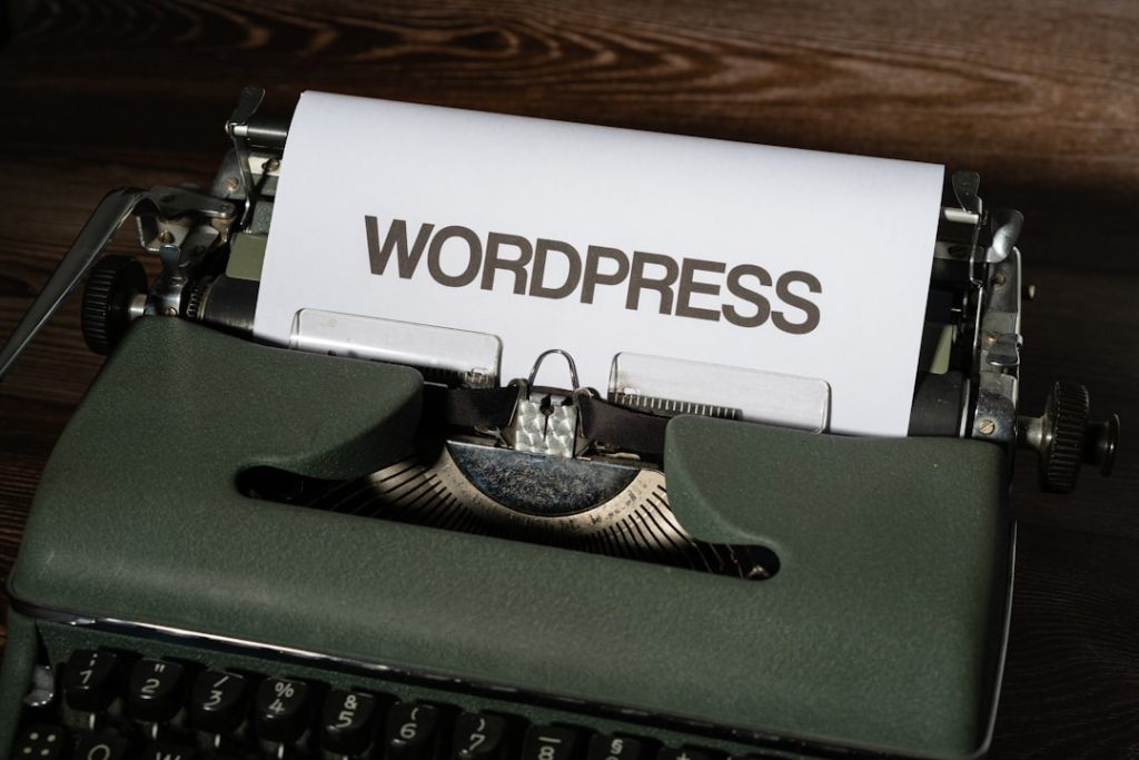 a close up of a typewriter with the word wordpress printed on it wordpress hosting server maintenance managed hosting - AI Bud