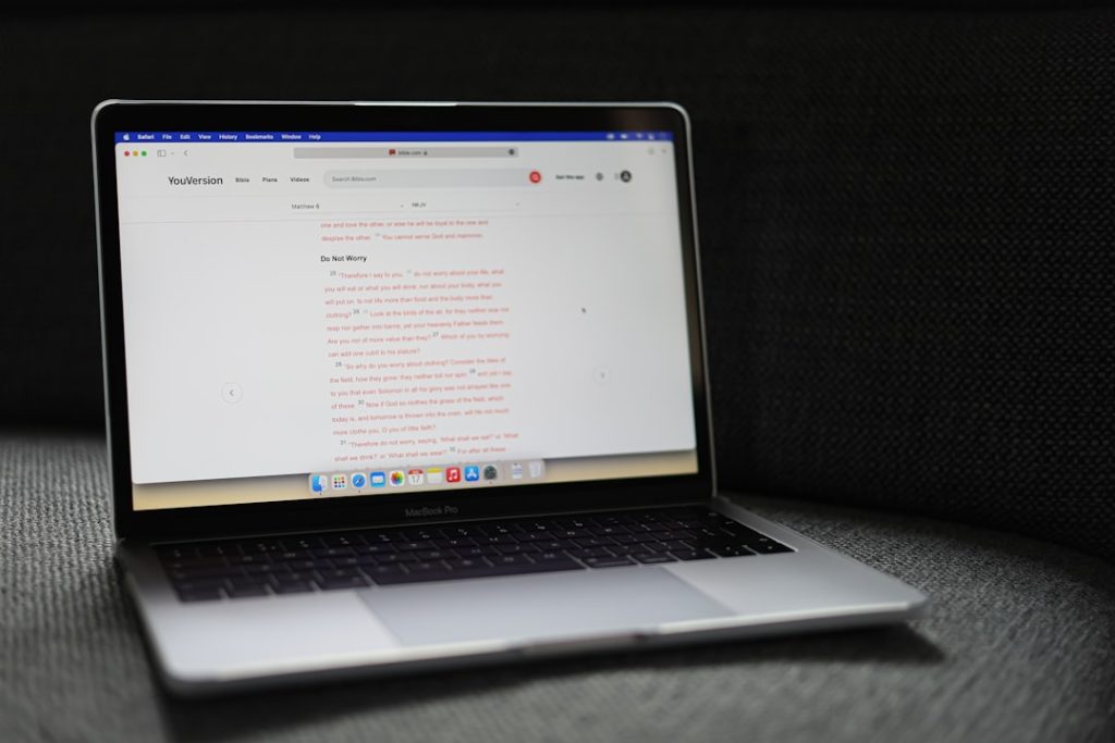 a laptop with a blank screen seo optimization content writing real time suggestions - AI Bud