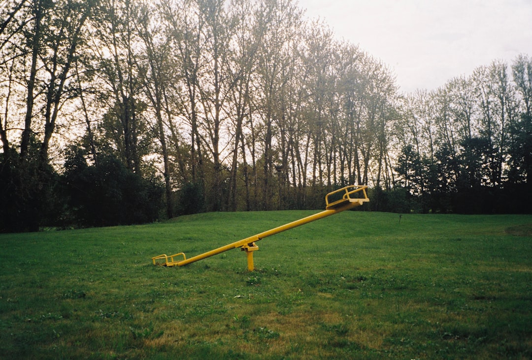 a yellow object in a grassy area devops pipeline ci cd git branching - AI Bud