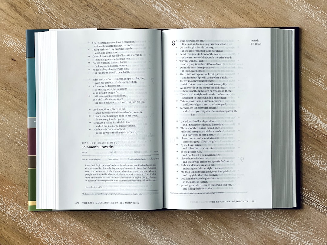 an open book on a wooden table faq page table of contents wordpress navigation - AI Bud