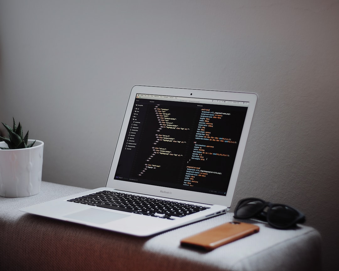 turned on MacBook Air on desk developer toolswordpress backendsite building - AI Bud