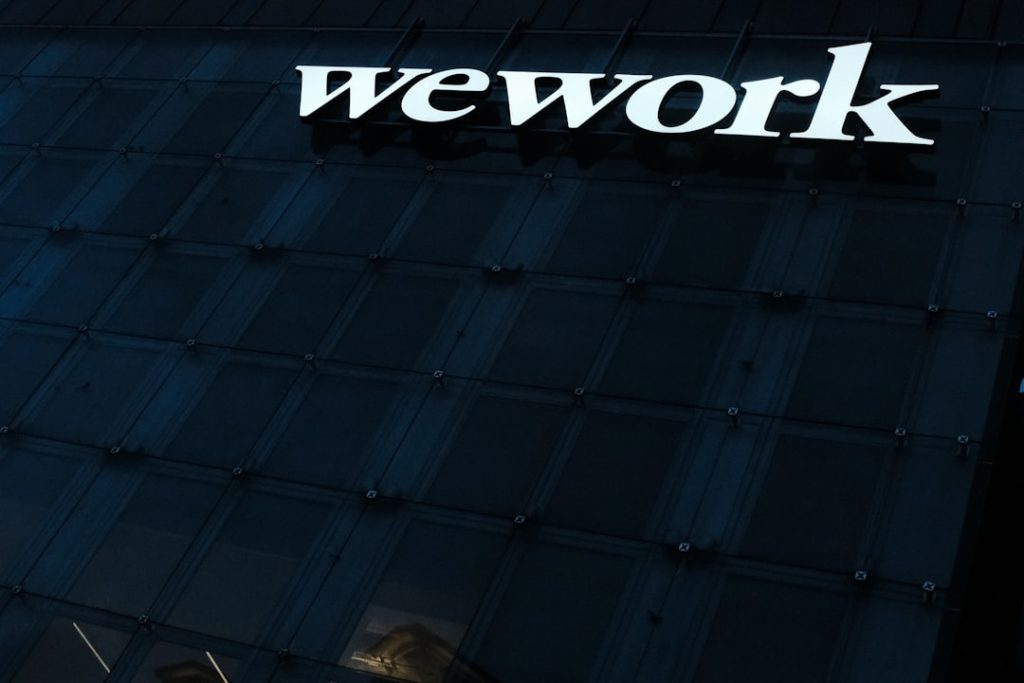 we work sign on the side of a building wordpress admin dashboard welcome page redirect settings - AI Bud
