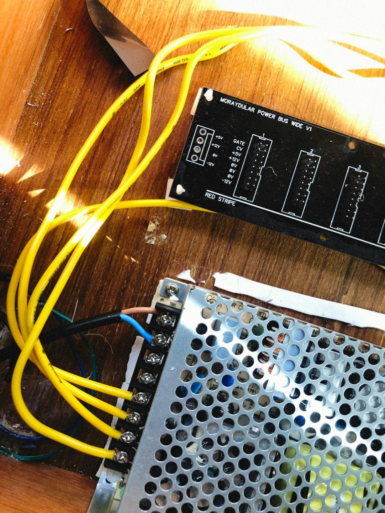 a circuit board with wires hardware check pc repair sata cable ssd connection - AI Bud