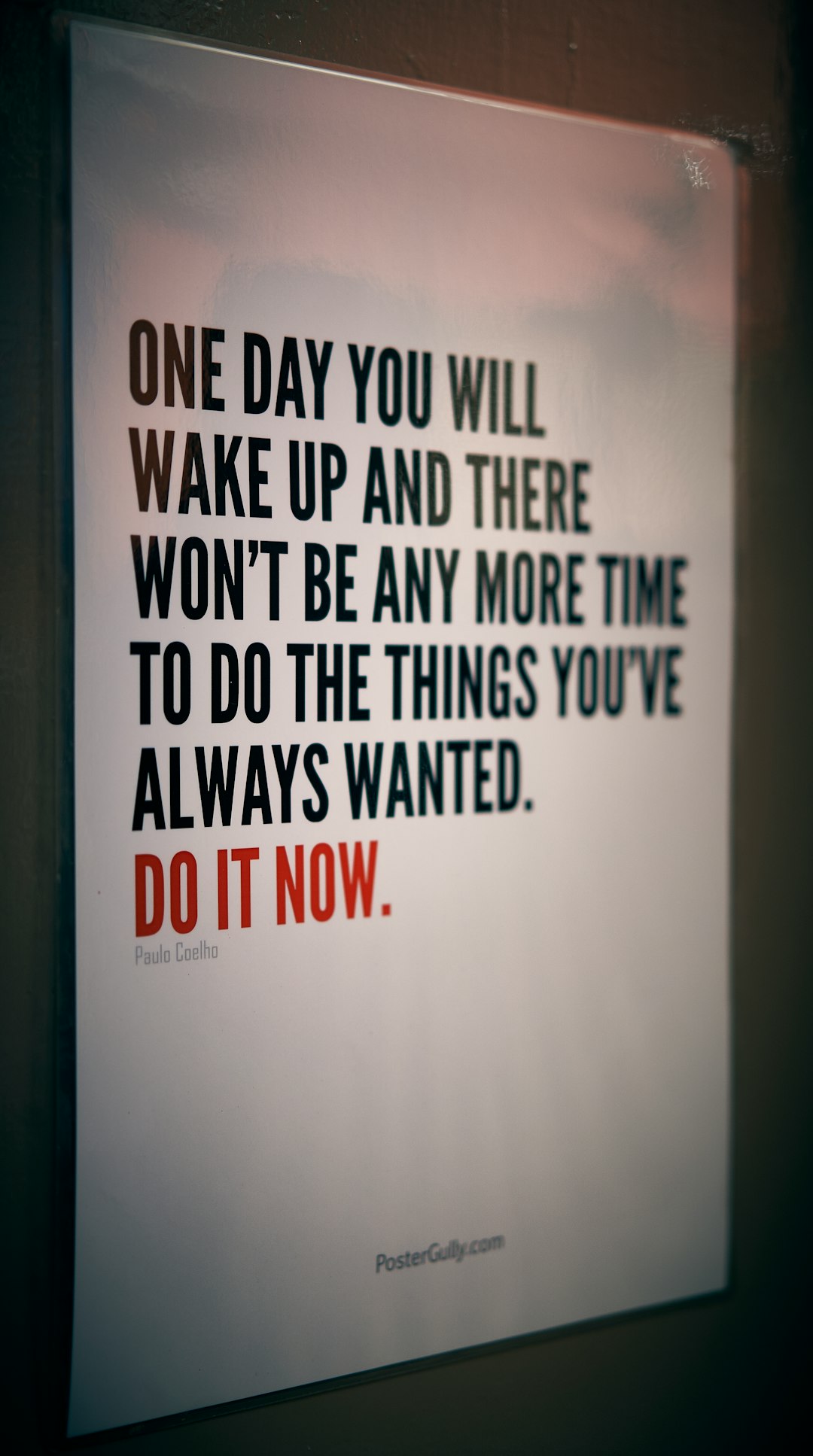 Poster with a motivational quote: 'One day you will wake up and there won't be any more time to do the things you've always wanted. Do it now.' (Paulo Coelho)