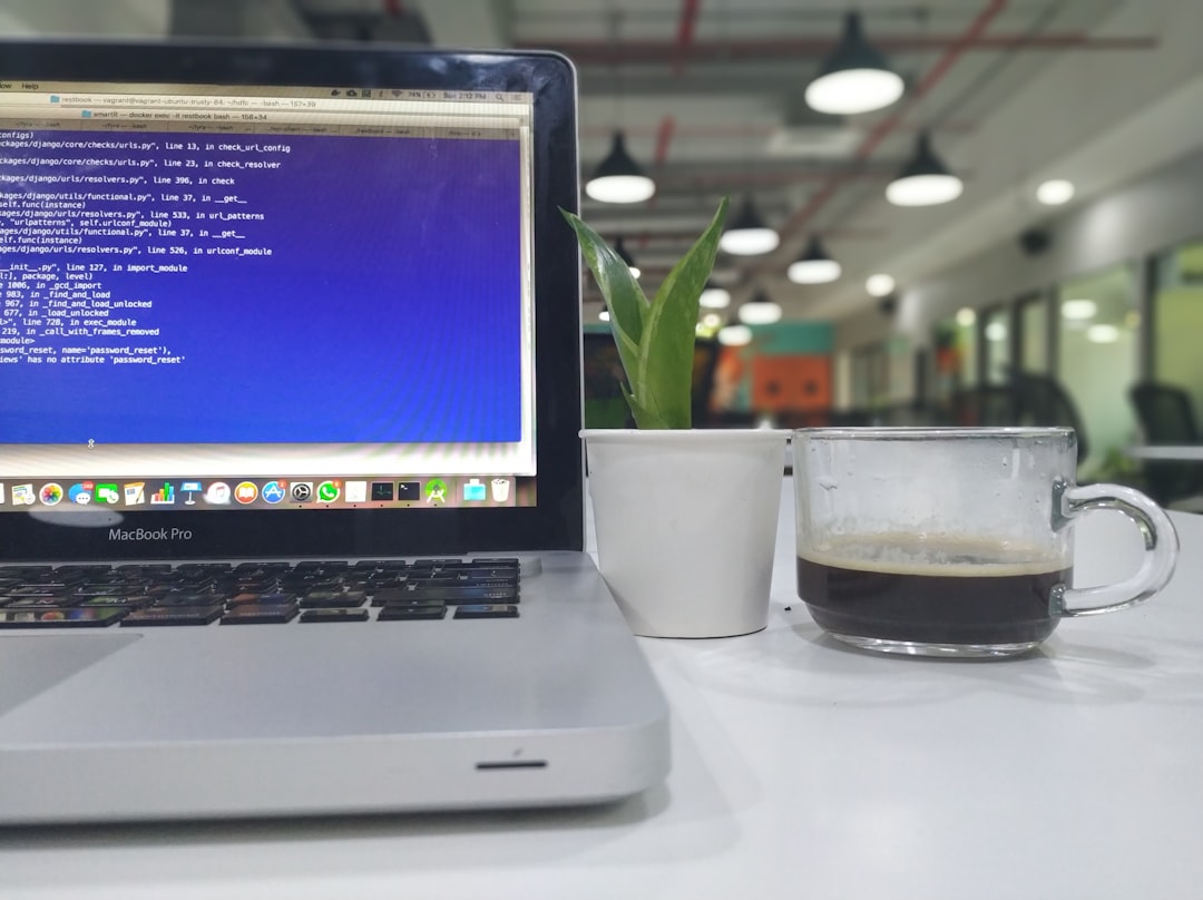 turned-on MacBook Pro developer code coffee terminal night - AI Bud