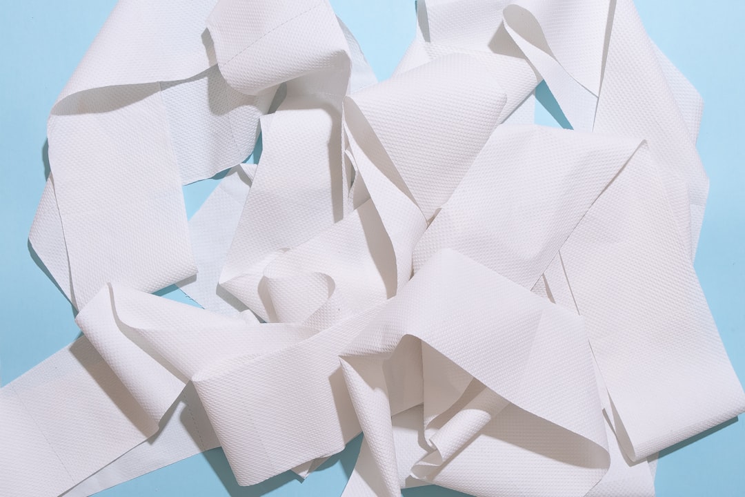 white paper on blue table paperless future business growth - AI Bud