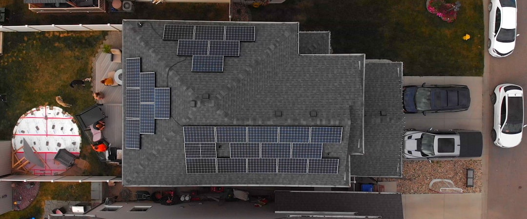 an aerial view of a house with solar panels on the roof minecraft config crafting recipe screen mod folder - AI Bud