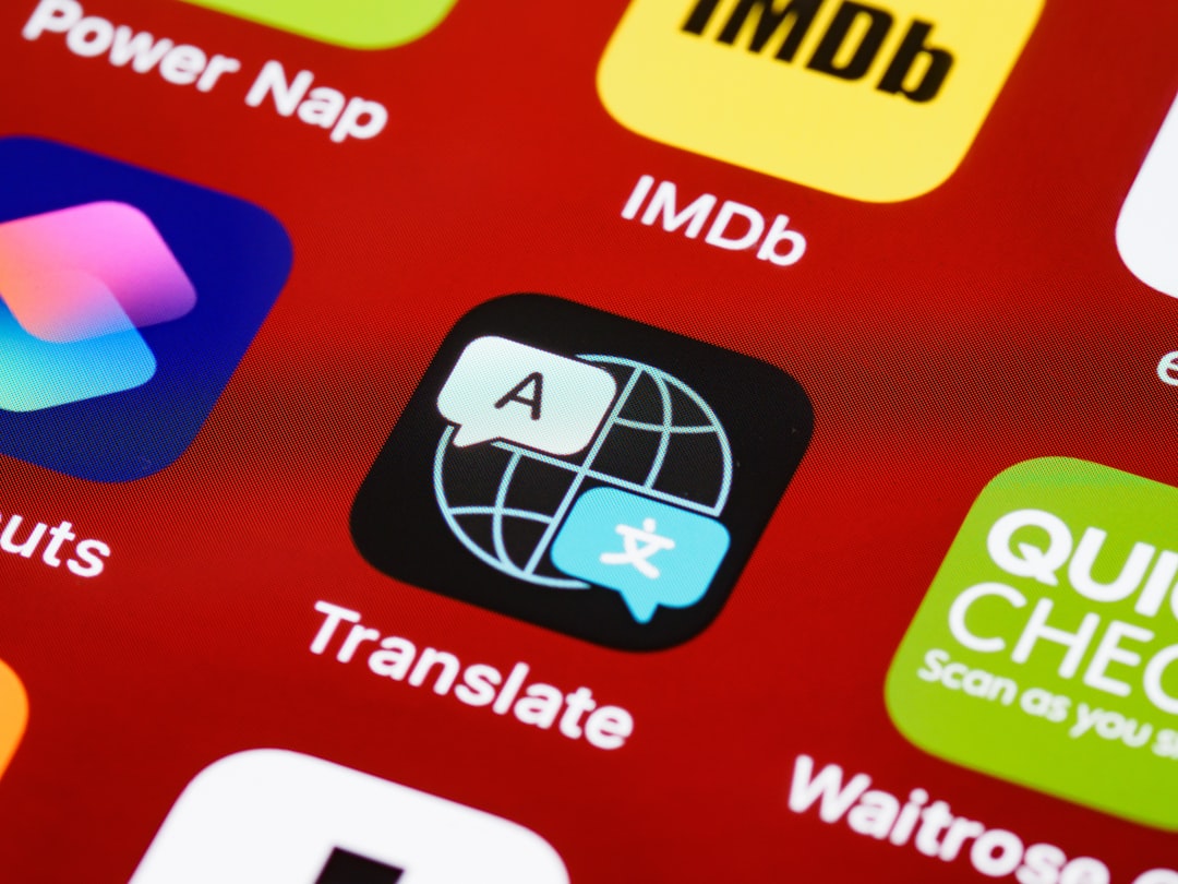 Translate app icon: globe with A and a language chat bubble on a dark rounded square