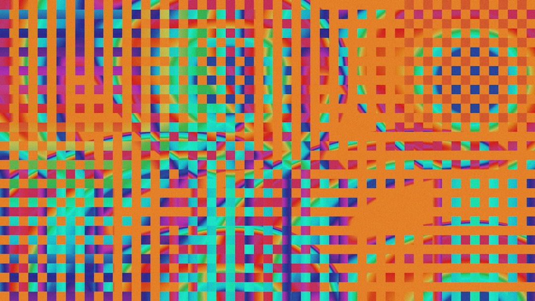 Abstract geometric artwork: an orange lattice over a vibrant rainbow mosaic of iridescent squares and rectangles.