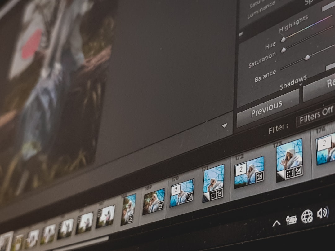 Screen showing a video editing timeline with thumbnail frames along the bottom and editing panels (Hue, Saturation, Balance) on the right side.