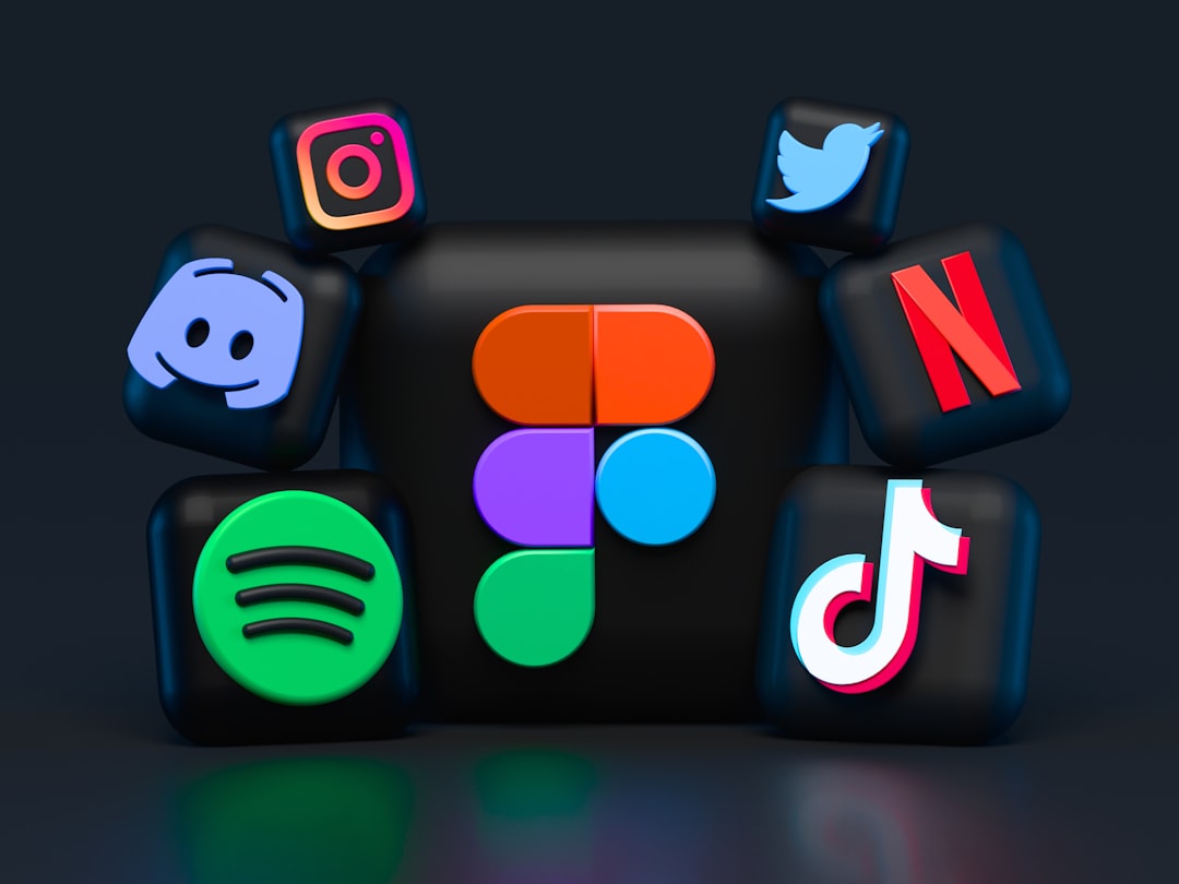 Figma logo centered on a black cube with 3D icons of Instagram, Twitter, Netflix, TikTok, Discord, and Spotify floating around it.