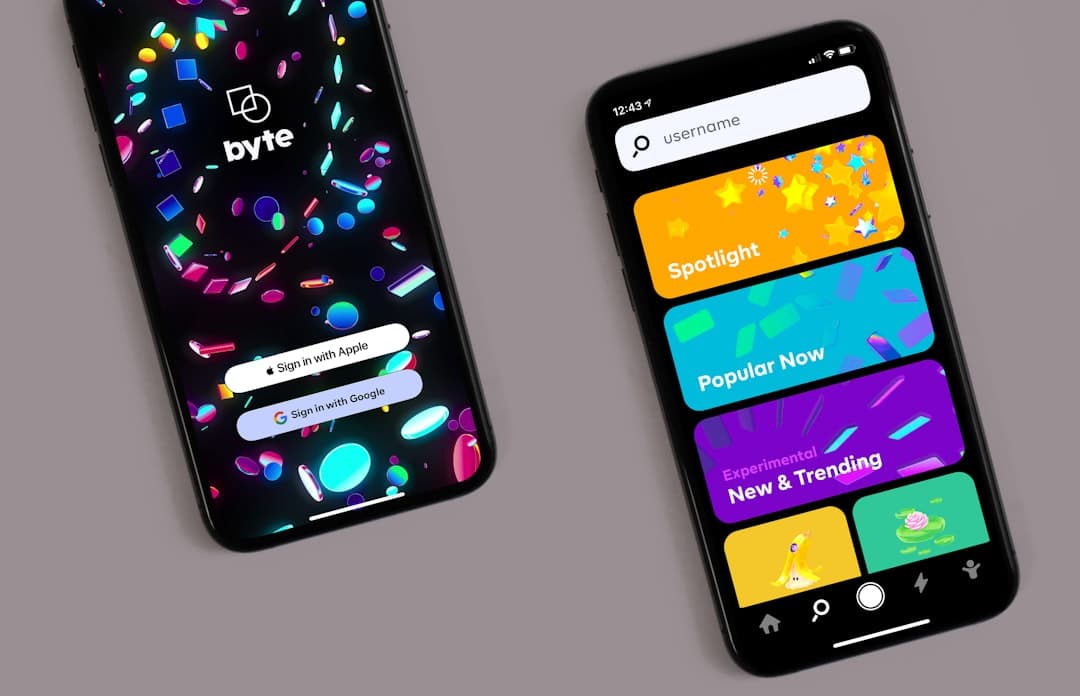 Two black smartphones angled on a gray surface. The left device shows a vibrant confetti wallpaper with a 'byte' logo and rounded sign‑in options ('Sign in with Apple', 'Sign in with Google'). The right device displays a yellow-orange 'Spotlight', cyan 'Popular Now', purple 'New & Trending' cards stacked vertically, with navigation icons along the bottom.
