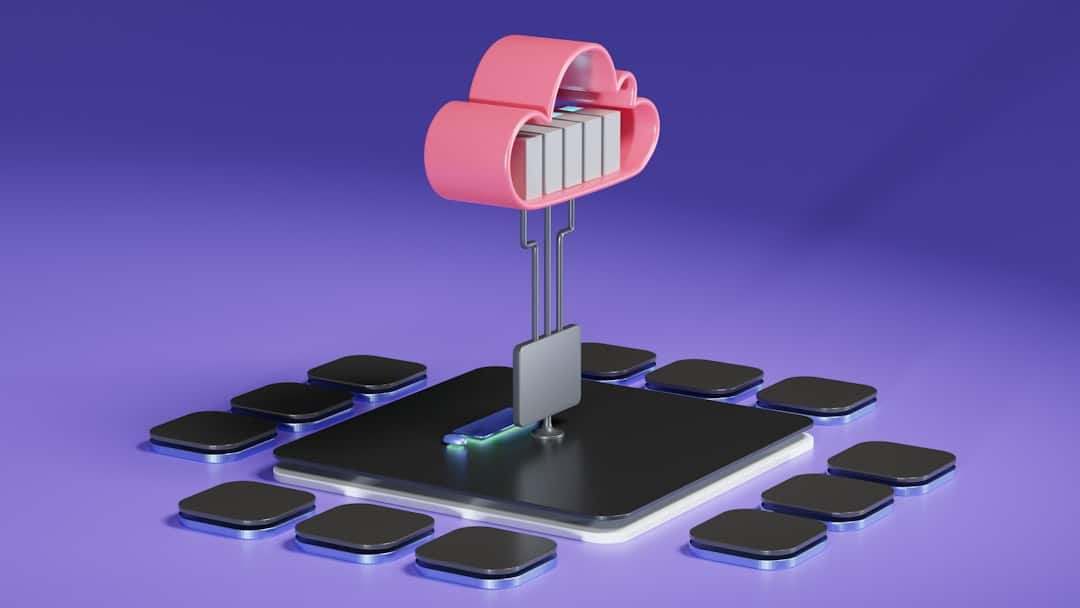 Pink cloud-shaped data storage connected to a central microprocessor, symbolizing cloud storage.