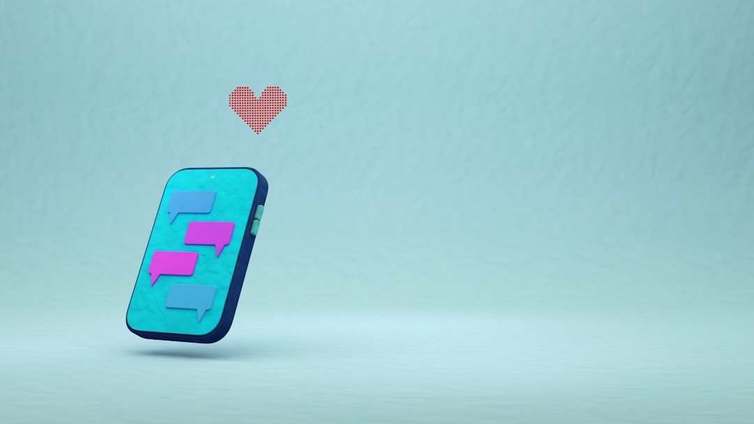 Tilted smartphone with colorful chat bubbles on screen and a pixel heart floating above.