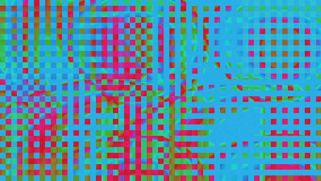 Vivid abstract geometric pattern with turquoise grid lines over multicolored squares and rectangles.