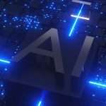 3D block with the letters AI glowing in blue on a circuitry-filled background, illustrating artificial intelligence.