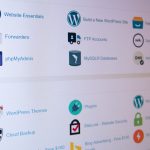 Screenshot of a hosting control panel with icons and labels like Website Essentials, Forwarders, phpMyAdmin, WordPress, and MySQL Databases for website management