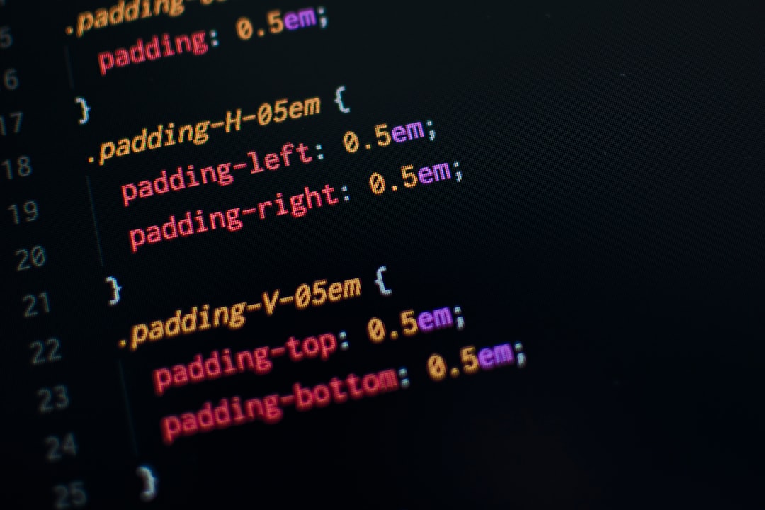 Close-up of CSS code showing padding values like padding-left: 0.5em; padding-right: 0.5em; on a dark editor screen.