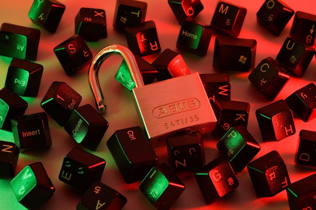 Padlock surrounded by scattered keyboard keys, symbolizing cybersecurity and data protection with red-green lighting.