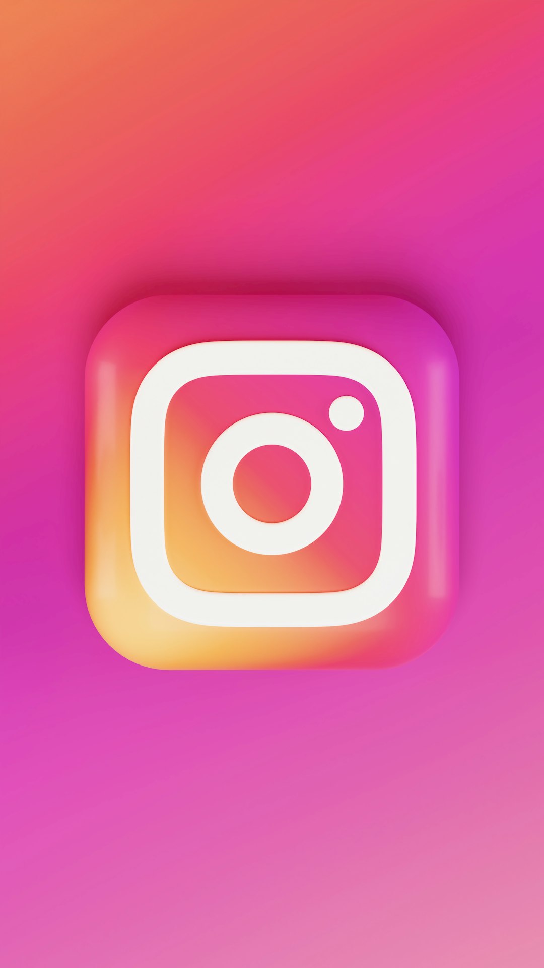Instagram app icon with a white camera glyph on a bright pink–orange gradient background