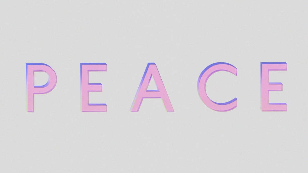 Pastel gradient letters spell 'PEACE' on a pale background.