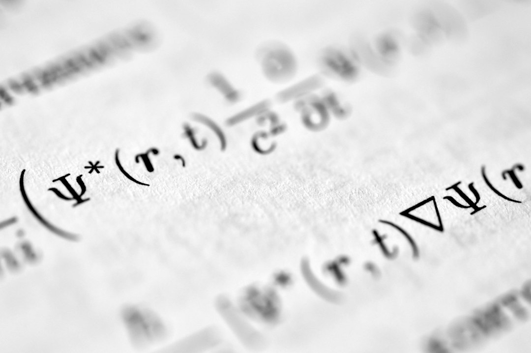 Close-up of handwritten mathematical equations on paper, featuring symbols like Ψ*, (r,t) and a square root sign, out of focus in the background.