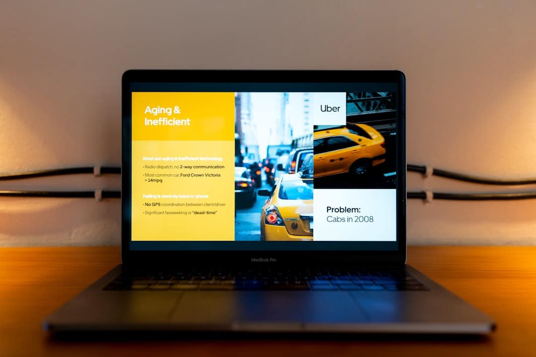 Laptop on a wooden desk displaying a multi-panel presentation about taxis and urban issues.