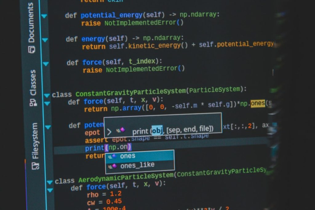 Code editor with Python-like syntax and autocomplete dropdowns visible on screen.