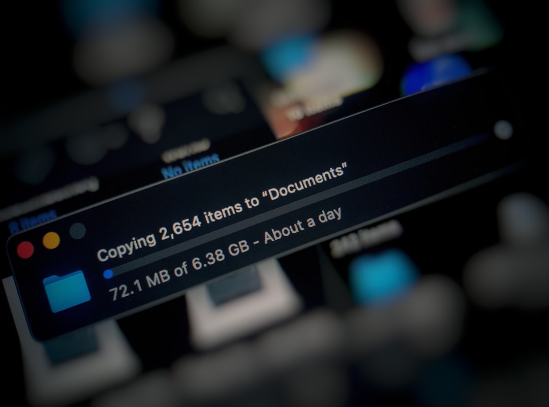 Dialog showing file copy: 2,654 items to 'Documents', 72.1 MB of 6.38 GB, about a day left.