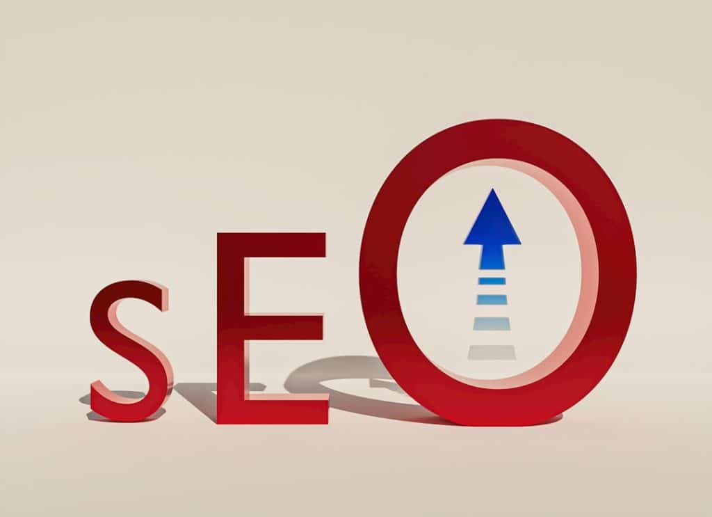 3D letters spelling SEO with a blue upward arrow inside the O, symbolizing growth in search rankings.