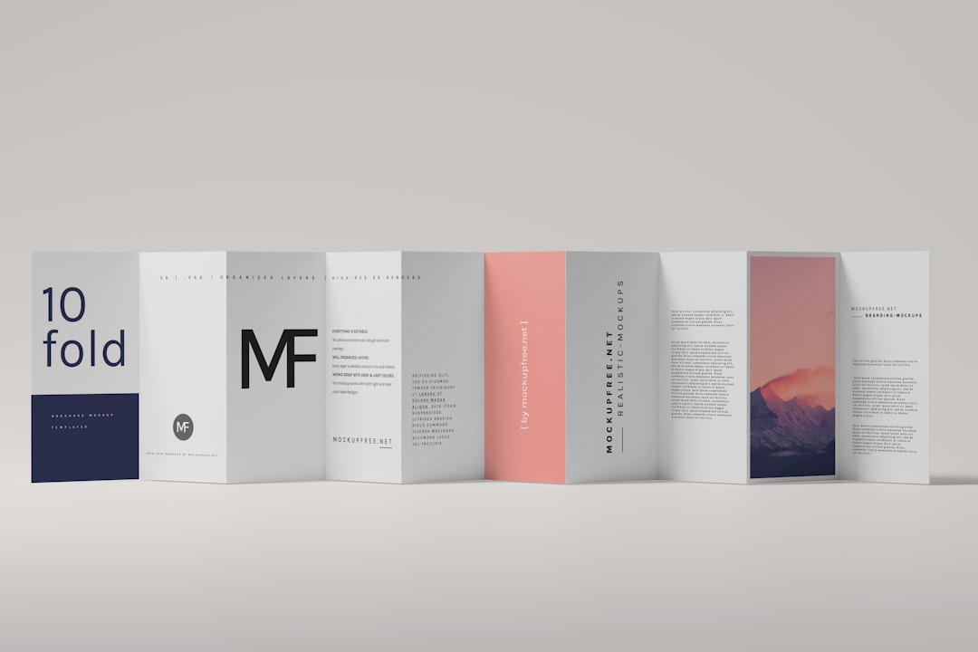 Row of ten folded brochure mockups standing upright on a light gradient background, including a '10 fold' panel and varied logos/colors in each panel.