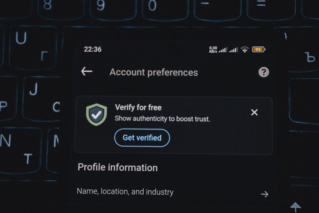 Phone screen shows a dark app settings page titled Account preferences, with a 'Verify for free' prompt and a Get verified button.