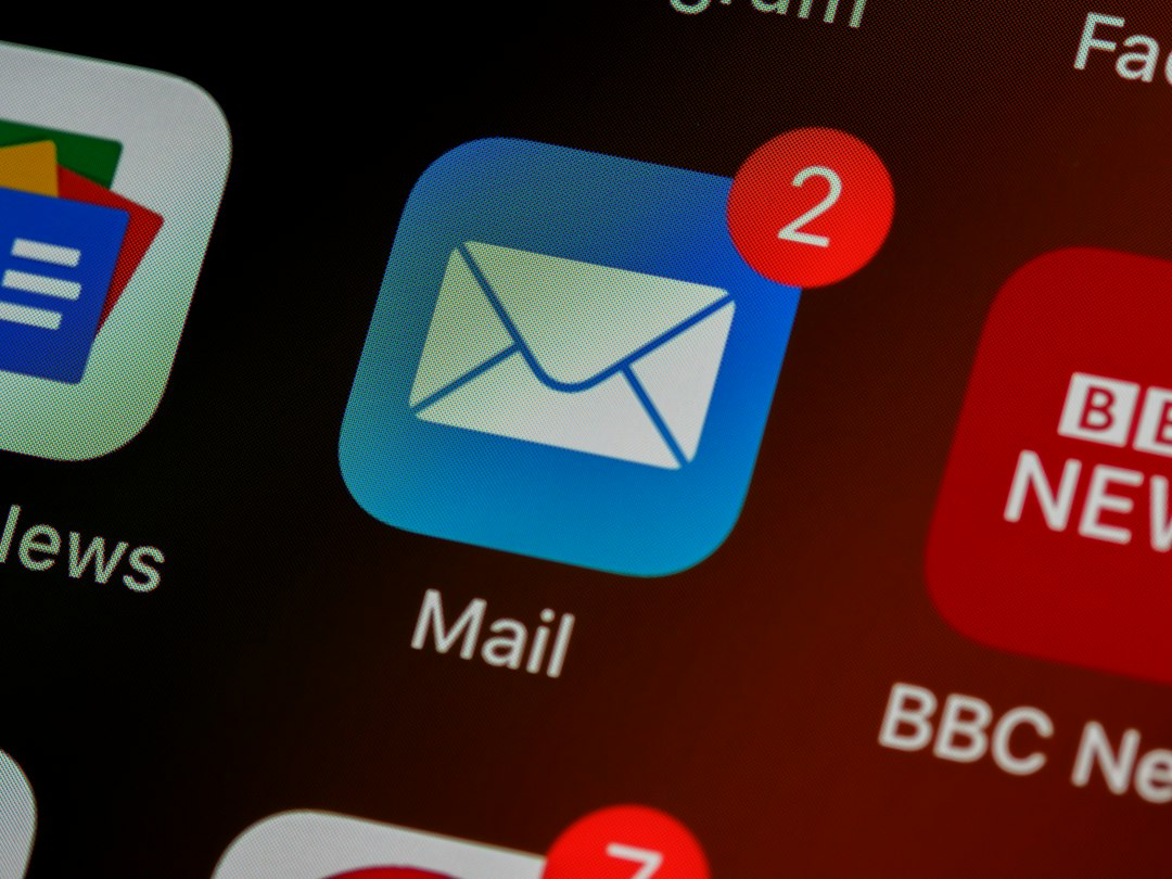 Blue Mail app icon with a white envelope and a red badge showing 2 new messages on a smartphone screen