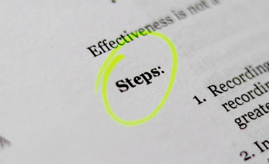 Close-up of a document with the word 'Steps:' circled in neon yellow highlighter on a printed page.
