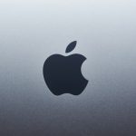 Apple logo centered on a blue‑gray gradient background