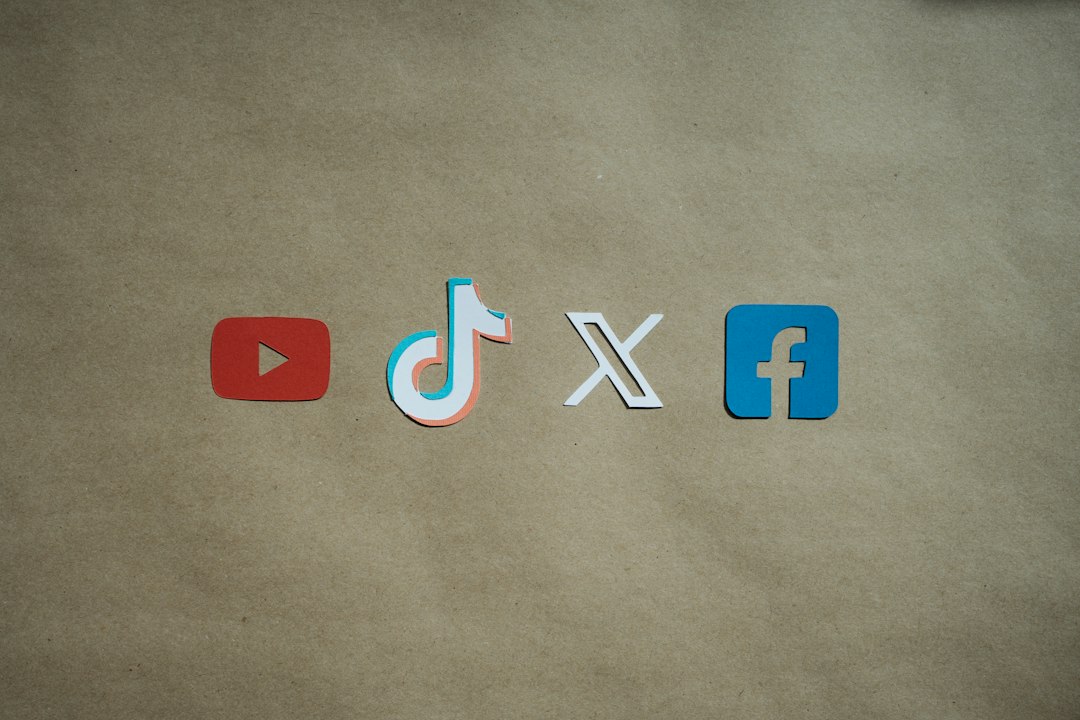 Row of social media icons: YouTube, TikTok, X, and Facebook on a brown paper background, representing platforms for sharing content.