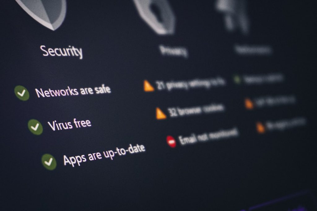 Security dashboard showing green checkmarks for Networks are safe, Virus free, and Apps are up-to-date.