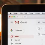 Laptop screen showing Gmail inbox with Compose button and red Inbox highlight, Safari menu visible at the top