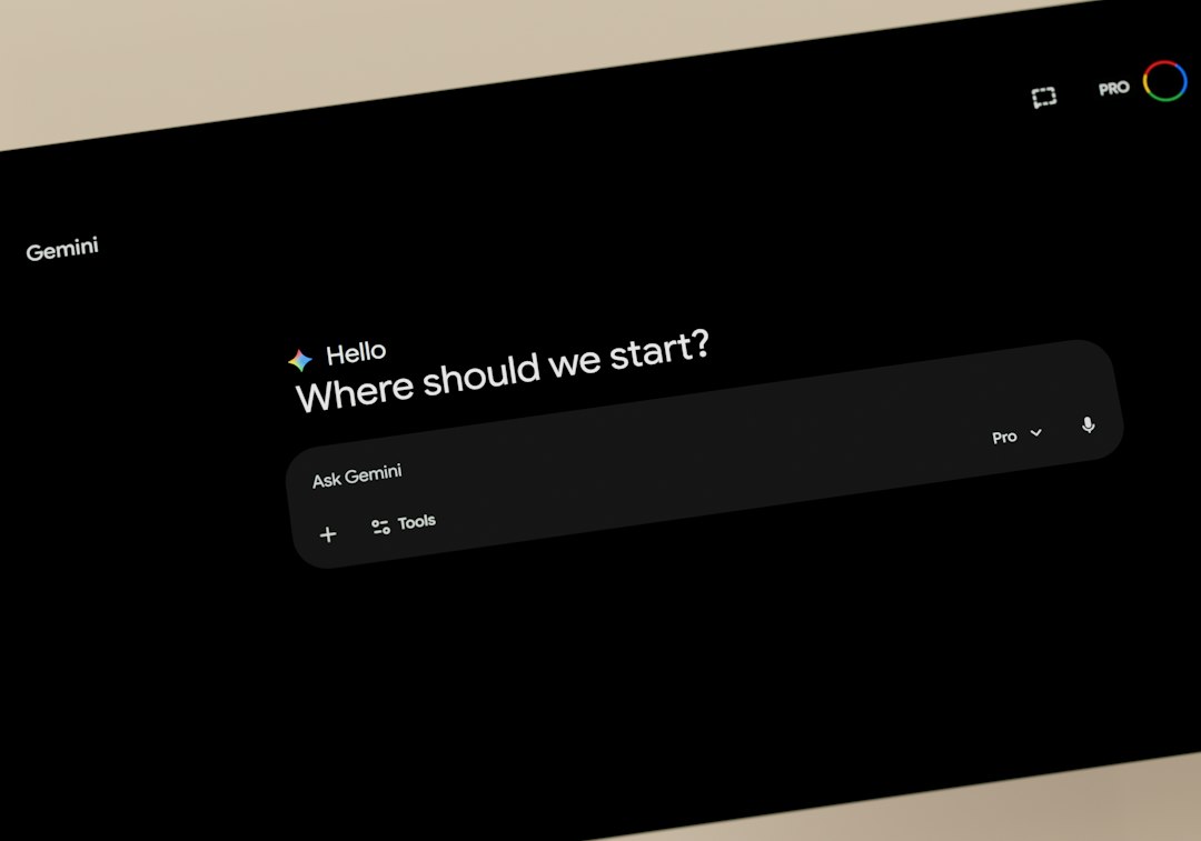 Dark marketing/intro screen for Gemini AI showing the prompt 'Where should we start?' with a rounded black input panel labeled 'Ask Gemini' and subtle controls at the bottom, set against a diagonal beige background.