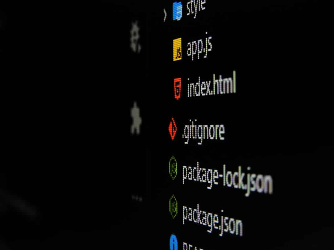 Screenshot of a dark code editor sidebar showing file names: style, app.js, index.html, .gitignore, package-lock.json, package.json, with colored icons beside each name.